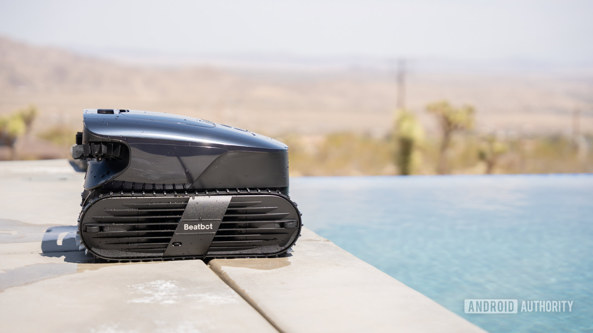 Beatbot AquaSense 2 Ultra next to pool wet 4 Beatbot AquaSense 2 Ultra next to pool wet 4