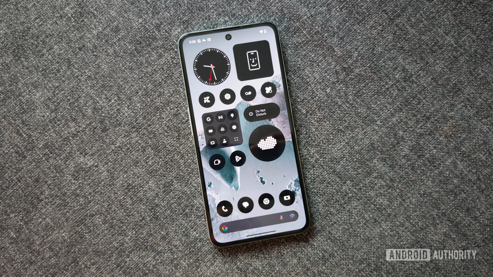 CMF Phone 2 Pro Home Screen shown while on gray fabric