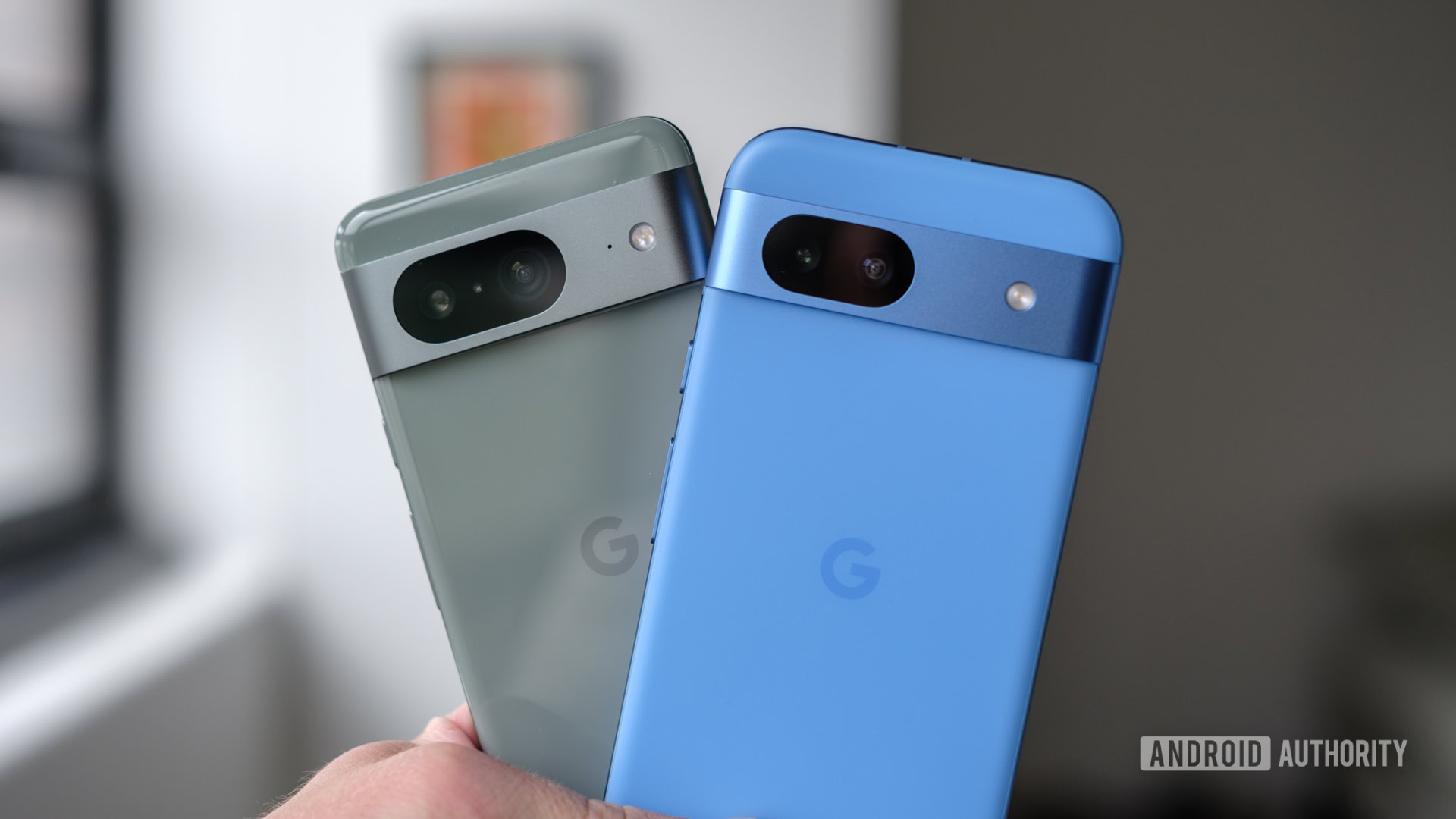 Google Pixel 8 vs Google Pixel 8a cameras in hand Google Pixel 8 vs Google Pixel 8a cameras in hand