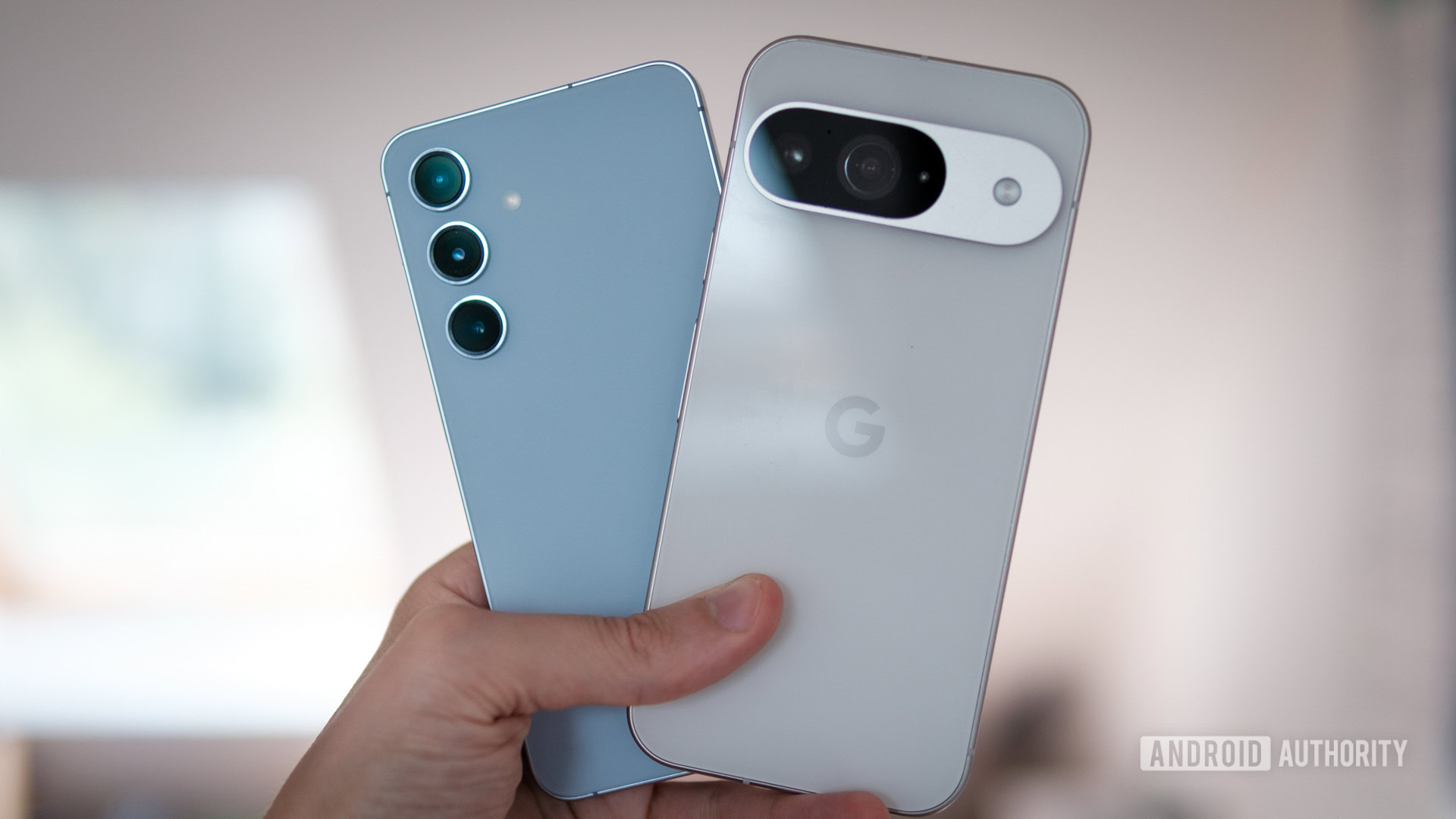 Google Pixel 9 and Samsung Galaxy S24 in hand Google Pixel 9 and Samsung Galaxy S24 in hand