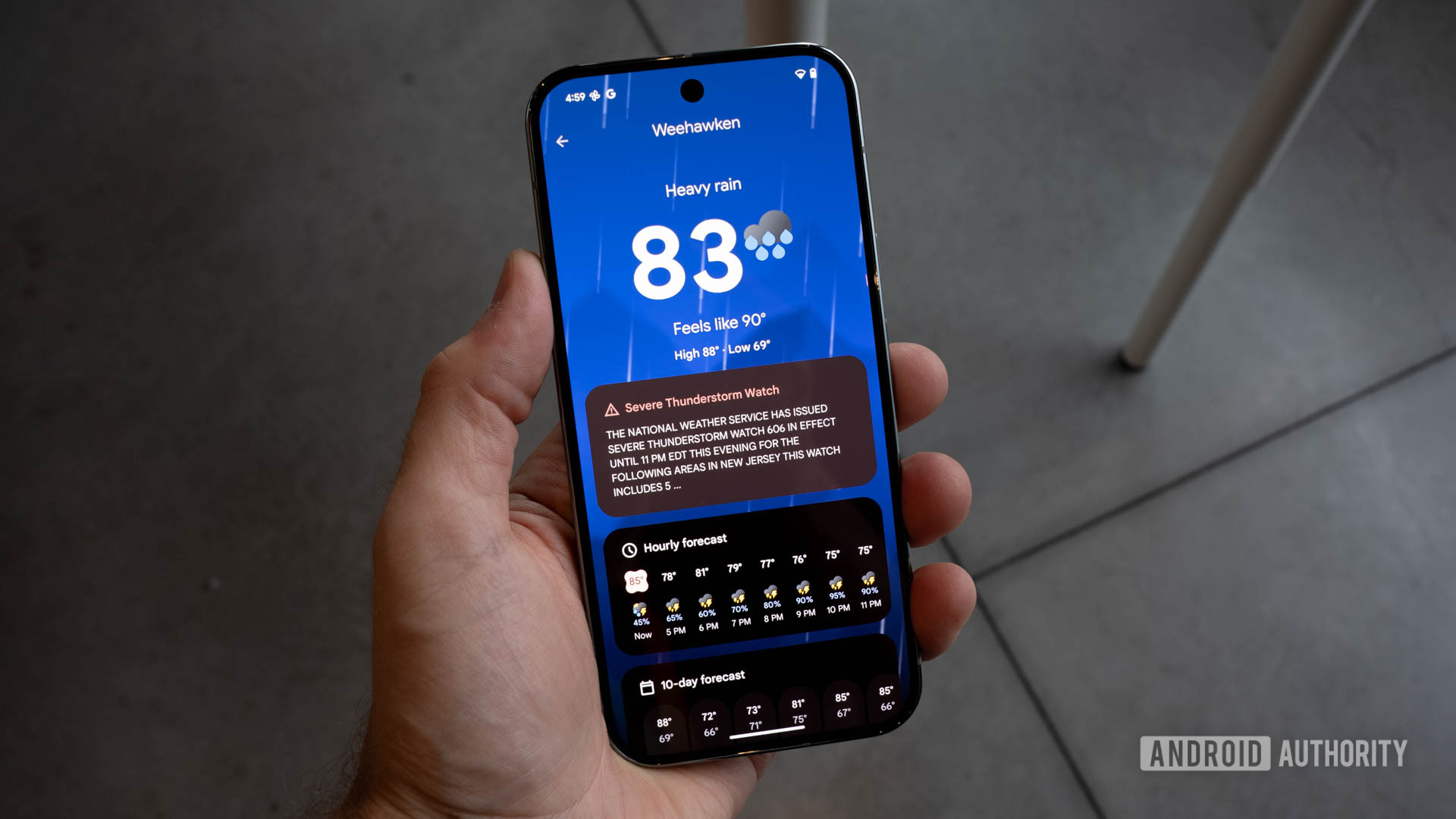 Google Pixel 9 Pro with new Weather app open showing a rainy day in Weehawken Google Pixel 9 Pro with new Weather app open showing a rainy day in Weehawken