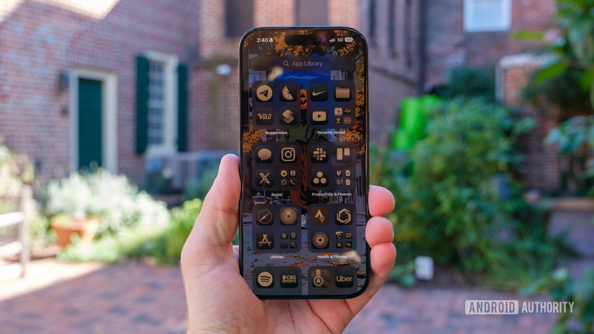 iPhone 16 Pro app library in hand iPhone 16 Pro app library in hand