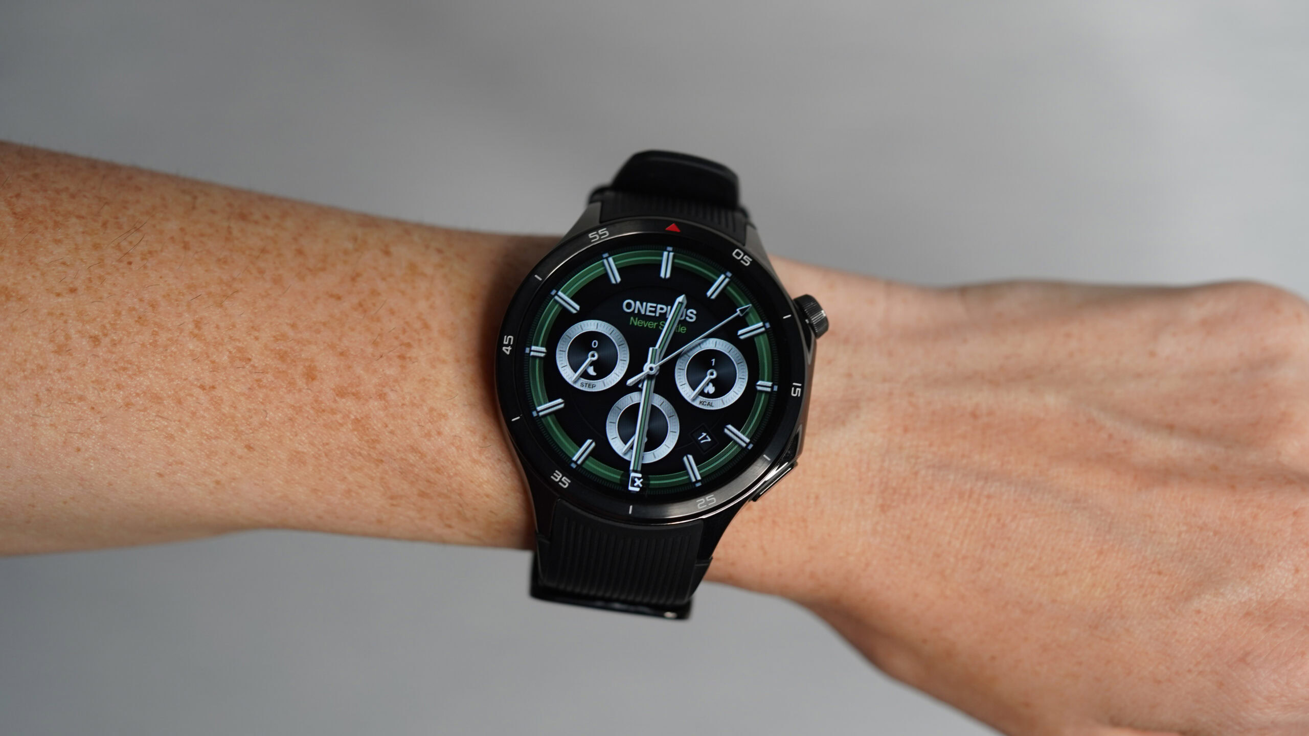 OnePlus Watch 3 Face A OnePlus Watch 3 on a user's wrist displays the time.