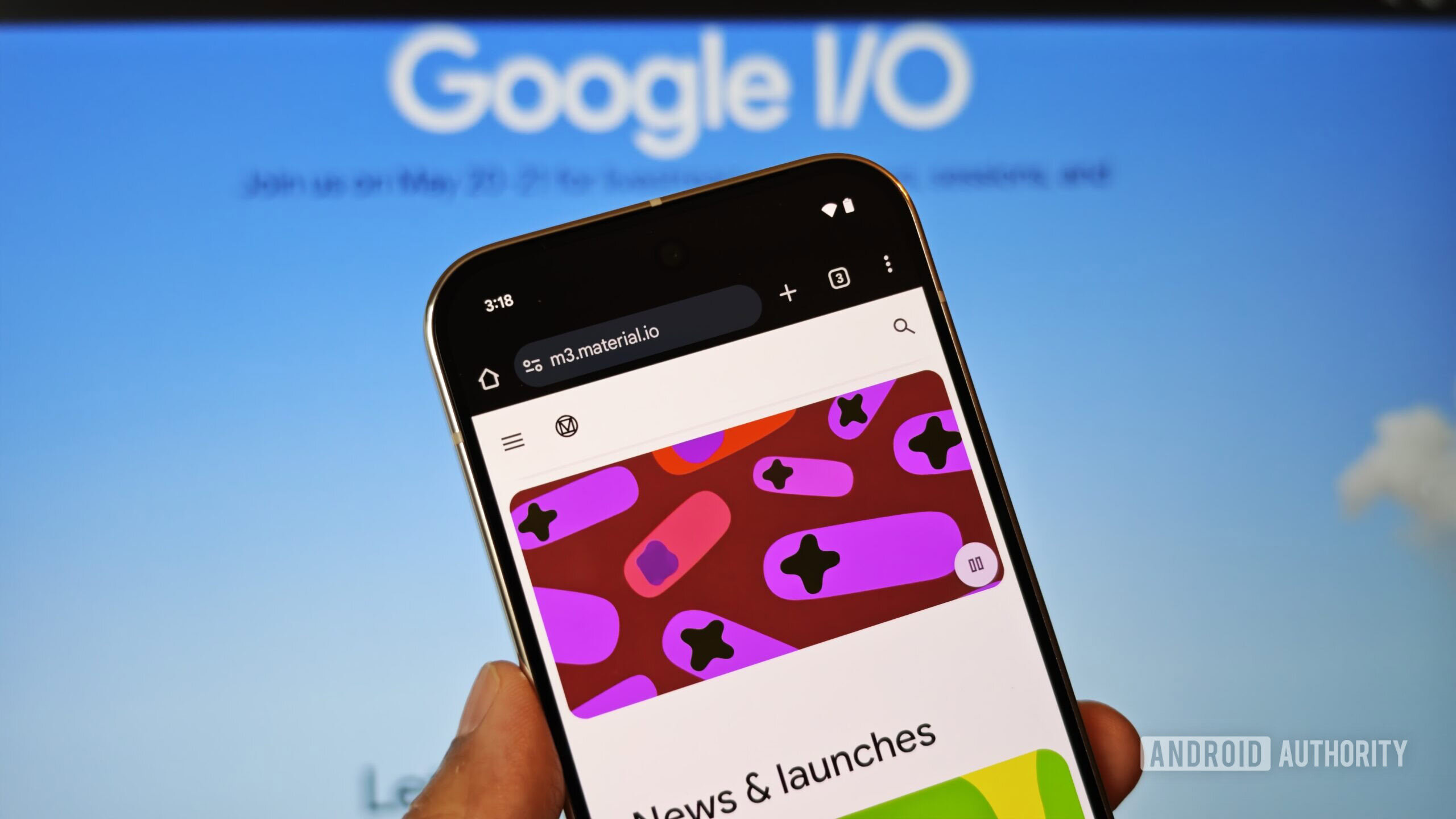 Photo of a phone on the Material Design page with the Google IO logo blurred Photo of a phone on the Material Design page with the Google IO logo blurred