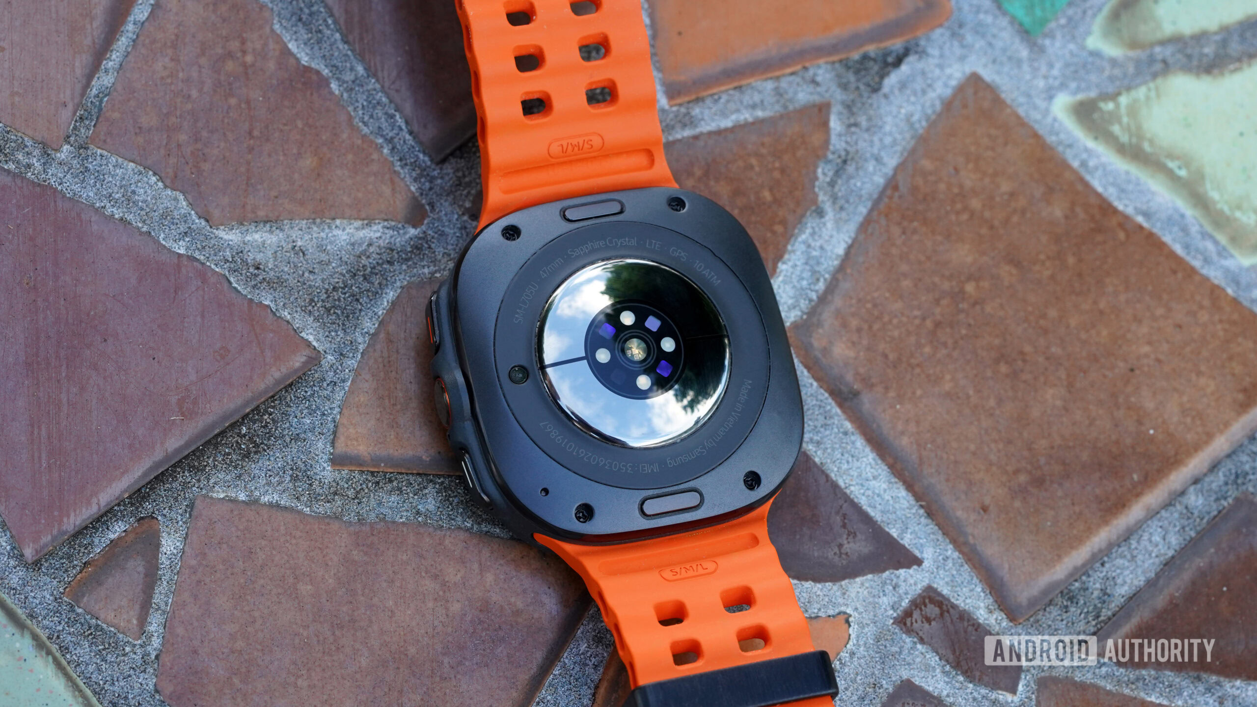 Samsung Galaxy Watch Ultra Sensor A Samsung Galaxy Watch Ultra rests face down, displaying the device's upgraded sensor.