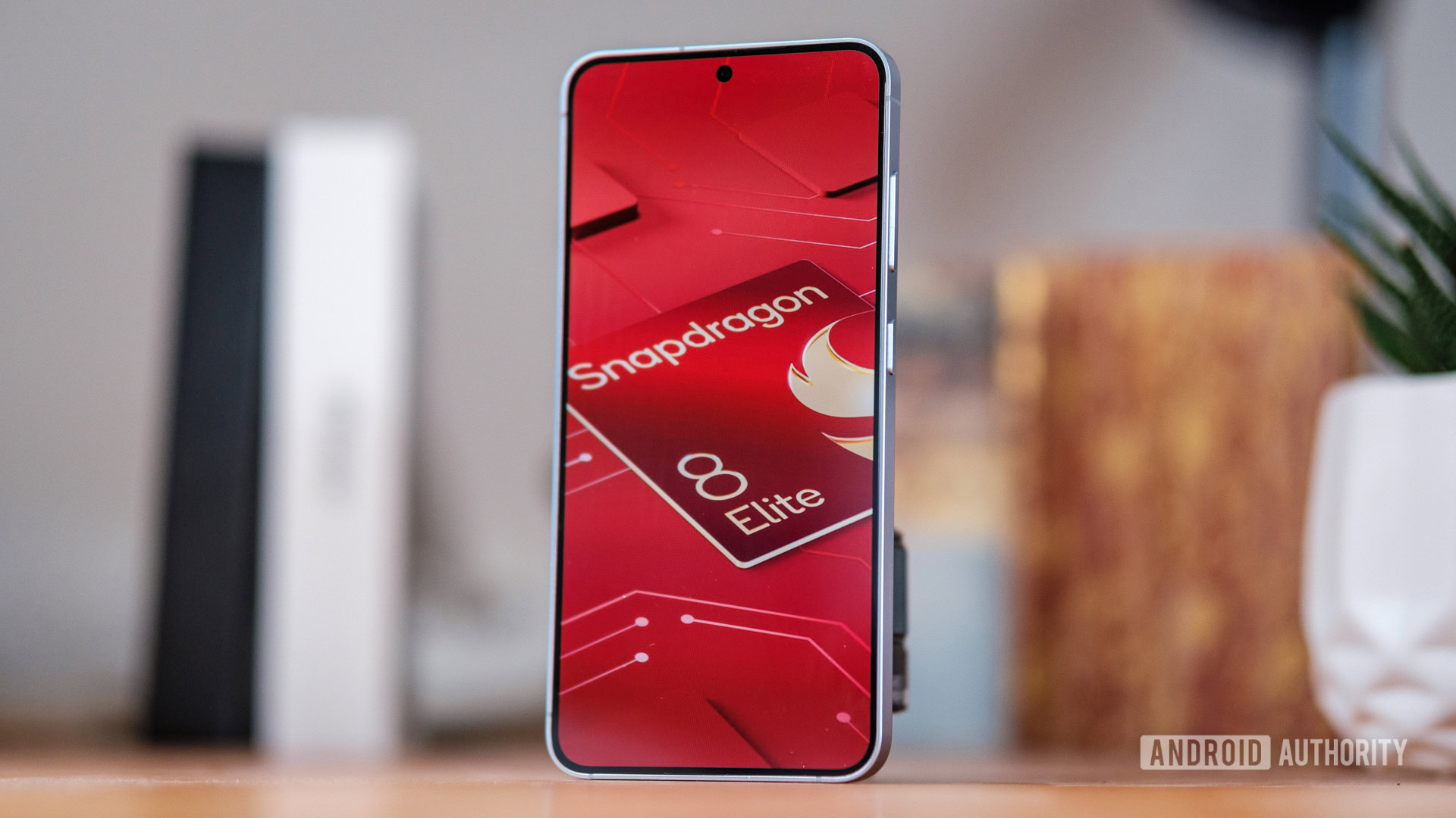 Snapdragon 8 Elite logo on phone angled Snapdragon 8 Elite logo on phone angled