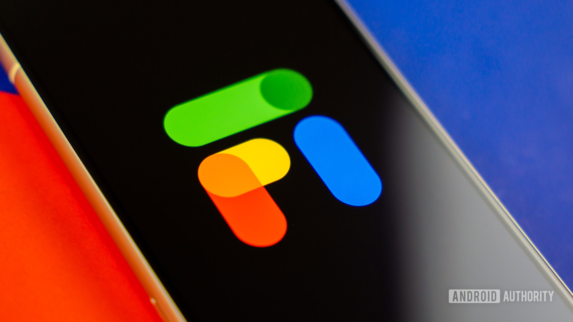Stock photo of Google Fi logo on phone with colorful background 8 Stock photo of Google Fi logo on phone with colorful background 8