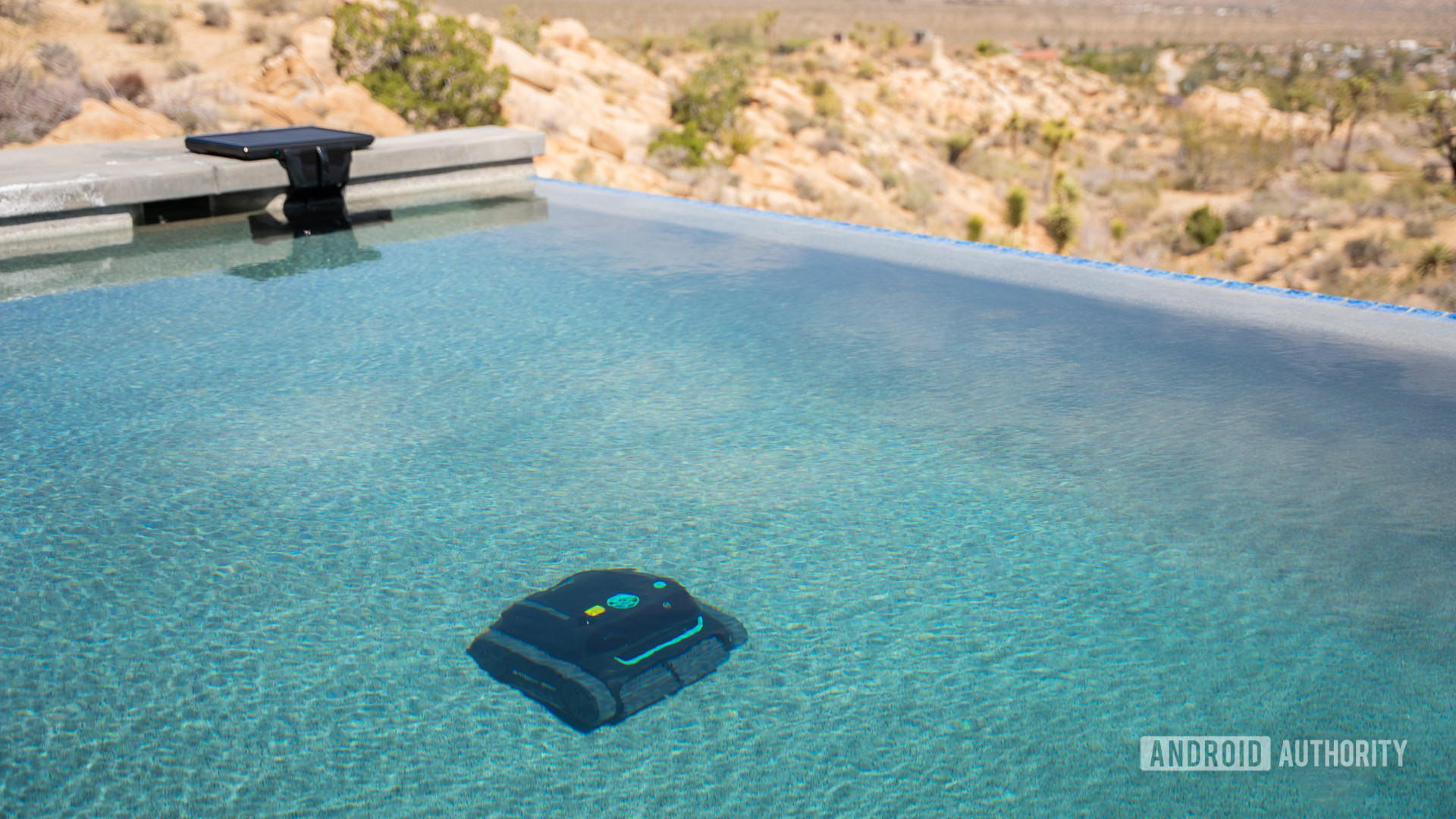 Wybot S2 Solar cleaning with charger on background 1 Wybot S2 Solar cleaning with charger on background 1