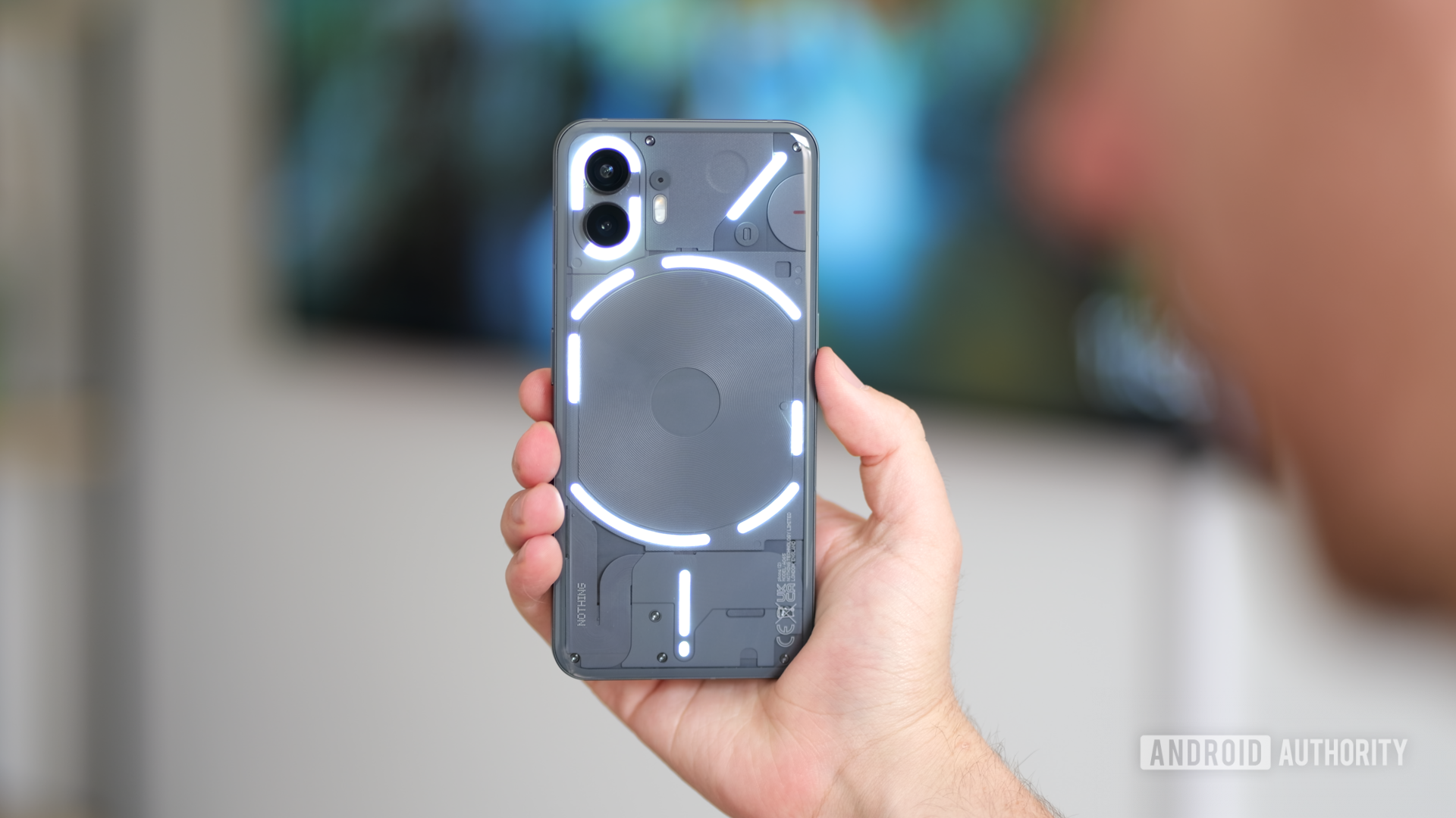 Nothing Phone 2 in gray with glyph lighting enabled Nothing Phone 2 in gray with glyph lighting enabled